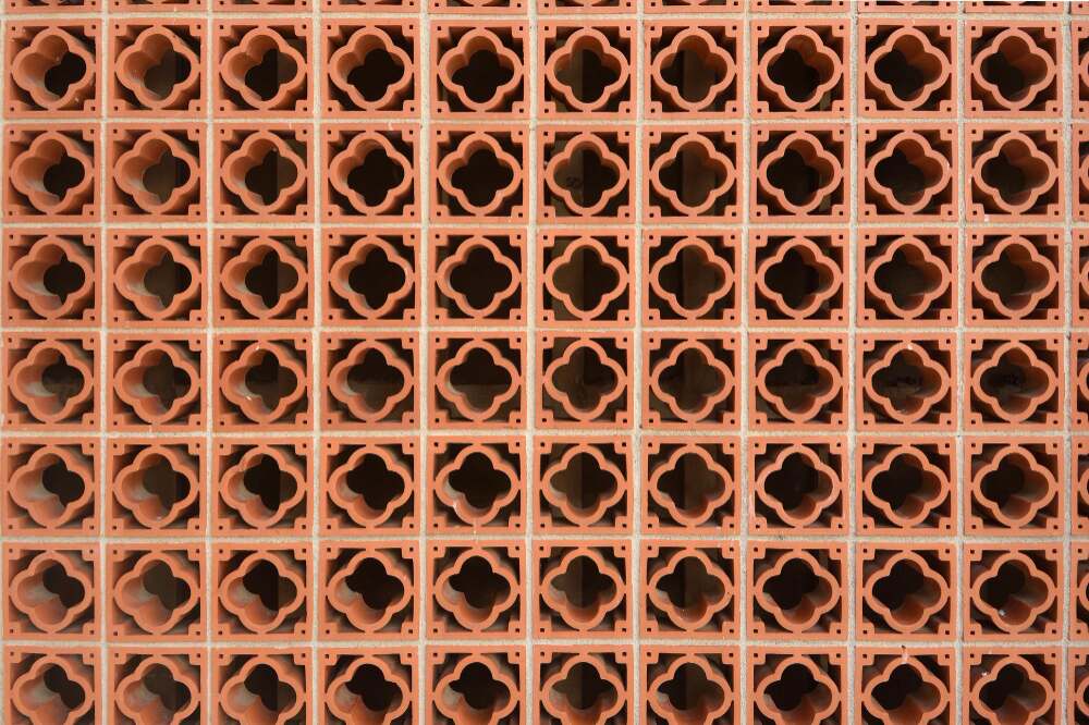 Beautiful terracotta jaali tiles from Tapco Tiles, designed for natural ventilation and elegant architectural styling.